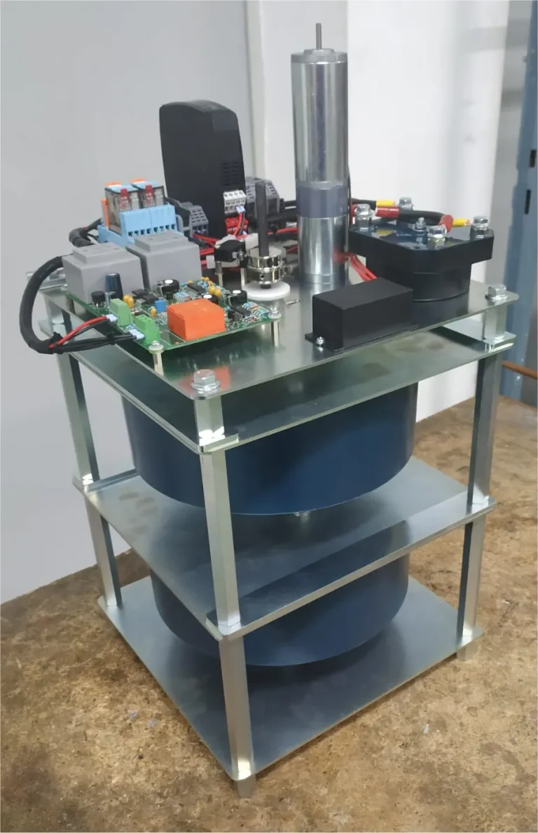 Variable transformer with dual stacked coils, motor drive system, and voltage control board, designed by Majestic Transformer Company for stable voltage regulation.