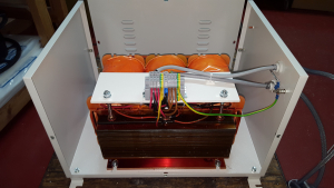 Three phase IP23 case transformer, cover removed, fitted with input and output cables